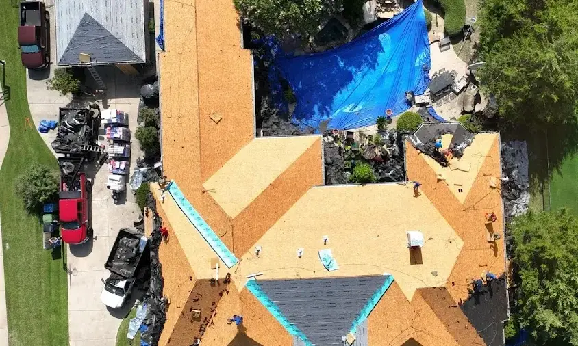 Professional Roof Repair being performed in Addison